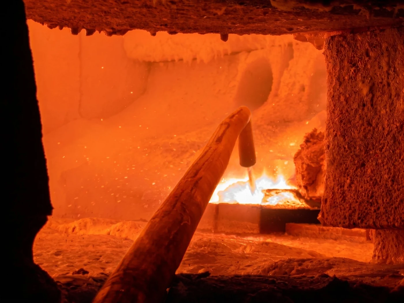 IRF technicians performing ceramic welding on a glass furnace superstructure